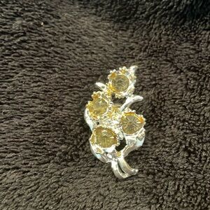 Vintage silver and yellow rhinestone pin